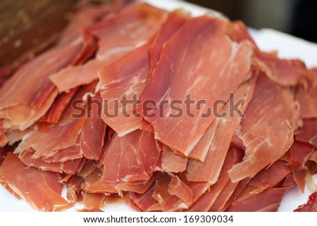 Sliced serrano ham at farmers market