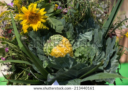 beautiful bouquets of flowers and vegetables
