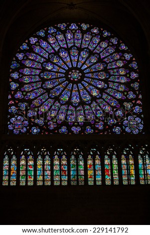 Paris, France - September 9, 2014: Paris, Notre Dame Cathedral. North transept rose window. The Glorification of the Virgin Mary