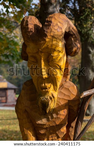 WISLA, POLAND - OCTOBER 16, 2014 : Fairy-like wooden figures from primaeval Slawic tales by Grzegorz Michalek