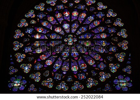 PARIS, FRANCE - SEPTEMBER 8, 2014: Paris, Notre Dame Cathedral. South transept rose window. UNESCO World Heritage Site. Paris, France