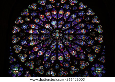 PARIS, FRANCE - SEPTEMBER 8, 2014: Notre Dame Cathedral. South transept rose window. UNESCO World Heritage Site. Paris, France