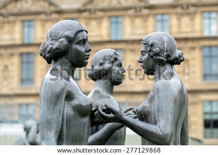 PARIS, FRANCE - SEPTEMBER 9, 2014: Paris -  Bronze sculpture The Three Nymphs  by Aristide Maillol in Tuileries garden