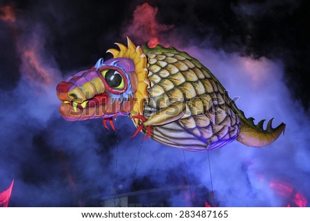 KRAKOW, POLAND - MAY 30, 2014: Yearly Great Dragons Parade connected with the fireworks takes place on the river Vistula in Cracow, Poland