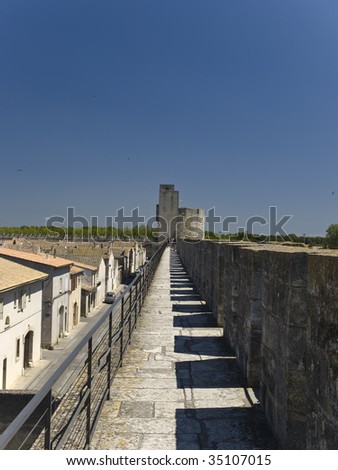 Aigues-Mortes is a commune in the Gard department in southern France. The medieval city walls surrounding the city are well preserved