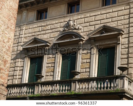 The facade of one of the buildings on the main street in Montepulciano
