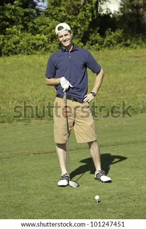 Young male golfer happy with his golf game