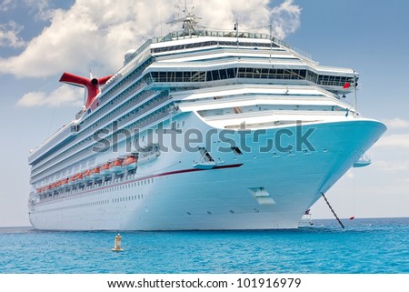 Luxury cruise ship anchored near the island of Grand Cayman, Cayman Islands, in the Eastern Caribbean.
