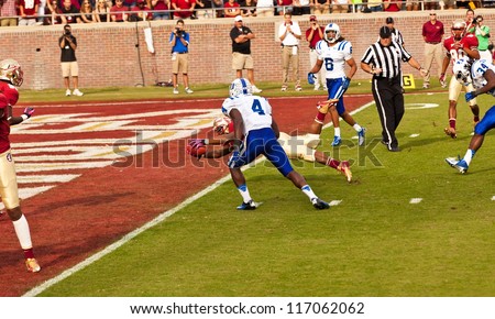 TALLAHASSEE, FL - OCT. 27:  Florida State dives for a touchdown, beating Duke University at Doak Campbell Stadium in Tallahassee, Florida, on Oct. 27, 2012.