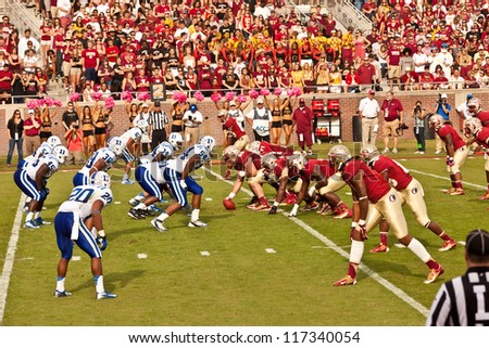 TALLAHASSEE, FL - OCT. 27:  FSU offensive line sets for the call from FSU Quarterback, EJ Manuel, as they face Duke University during Homecoming weekend at Doak Campbell Stadium on Oct. 27, 2012.