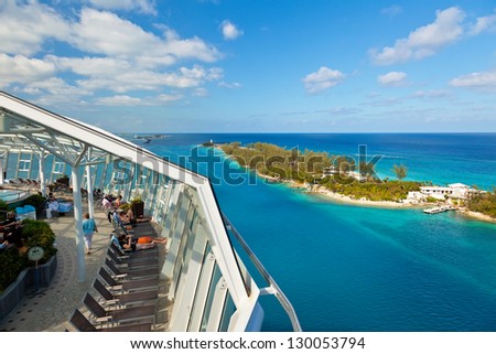 NASSAU BAHAMAS JAN 13 Passengers relax as the Oasis of the Seas departs the Bahamas on Jan 13 2013 The ship owned by Royal Caribbean is one of the largest ships on record NASSAU BAHAMAS JAN 13 Passengers relax as the Oasis of the Seas departs the Bahamas on Jan 13 2013 The ship owned by Royal Caribbean is one of the largest ships on record