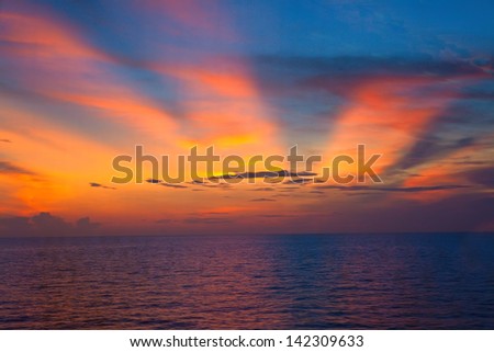 Golden glow over the Caribbean Sea at sunset