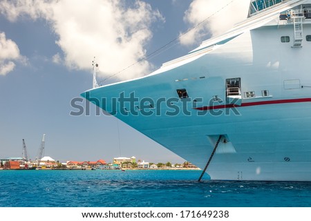 Cruise ship anchored offshore from the Caribbean island of the Cayman Islands.