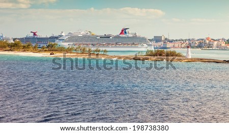 NASSAU, BAHAMAS - JAN. 13, 2013:  The Bahamas is a popular cruise destination with multiple cruise ships docked in the port, bringing thousands of tourists to the island on a daily basis.