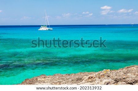 Large catamaran sailing on the Caribbean Sea in Grand Cayman, Cayman Islands