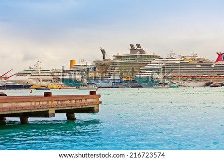 PHILIPSBURG, ST. MAARTEN - JAN.16, 2013: Cruise ships docked on the Dutch side of St. Maarten. Philipsburg is one of the busiest islands as the port can accommodate half dozen ships.