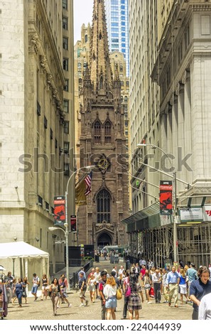 New York, NY - June 23, 2014: Trinity Church, built in 1846, and located at Broadway and Wall streets, is a historic and functioning parish church in the Episcopal Diocese of New York.