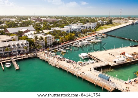 KEY WEST, FL - JULY 11:  Cruise passengers walk along Mallory Square in Key West on July 11, 2011.  Key West is famous for being the southernmost city in the continental U.S.