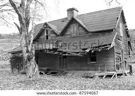 Creepy and spooky old abandoned house in black and white