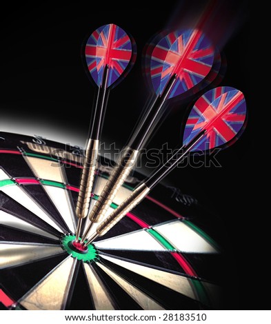 Three darts hitting bullseye on dart board