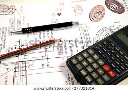 Scientific calculator, Pen and Pencil over the Engineering Drawing Map