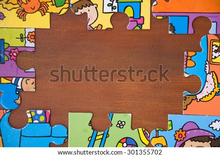 colorful puzzles on a wooden base