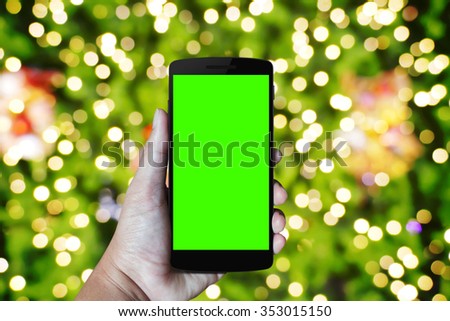 Modern mobile phone in the hand,on blur background image