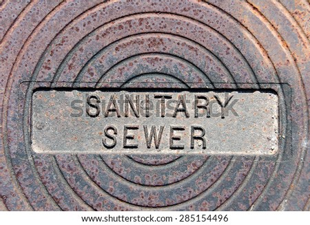 Sanitary Sewer iron cover on sewer system