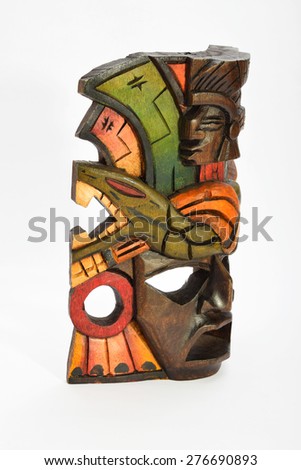 Indian Mayan Aztec wooden mask with anaconda and jaguar isolated on white background (right side view ~ 75 degrees, upper take)