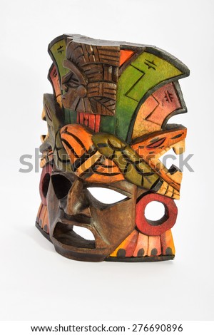 Indian Mayan Aztec wooden mask with anaconda and jaguar isolated on white background (left side view ~ 45 degrees, three quarters face, upper take)