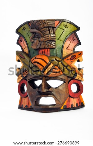 Indian Mayan Aztec wooden mask with anaconda and jaguar isolated on white background (almost front angle, full face, 10-15 degrees, vertical take)