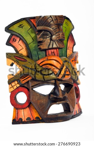 Indian Mayan Aztec wooden mask with anaconda and jaguar isolated on white background (right side view, ~ 45 degrees, three quarter face)