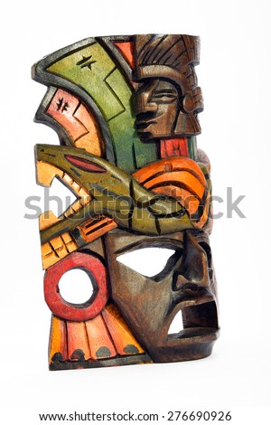 Indian Mayan Aztec wooden mask with anaconda and jaguar isolated on white background (right side view, ~ 60 degrees)