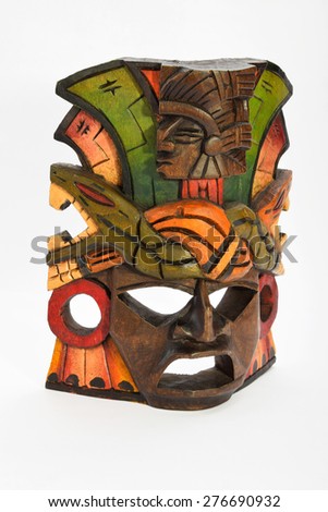 Indian Mayan Aztec wooden mask with anaconda and jaguar isolated on white background (right side view ~ 30 degrees, upper take)