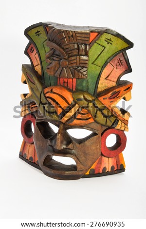 Indian Mayan Aztec wooden mask with anaconda and jaguar isolated on white background (left side view ~ 30 degrees, upper take)