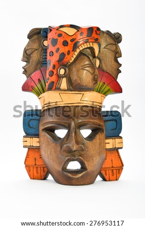 Indian Mayan Aztec wooden painted mask with roaring jaguar and human profiles isolated on white background (front, full face, vertical)