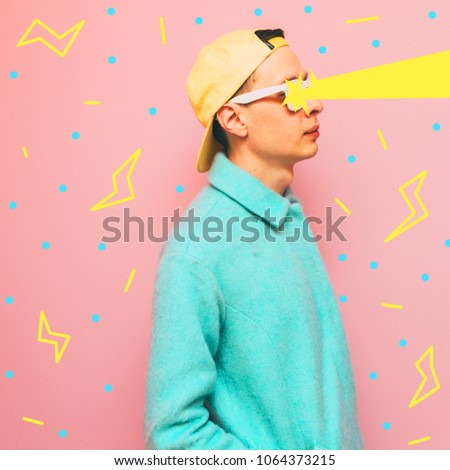 stylish and fashionable guy lets lightning out of his eyes. crazy surreal art collage