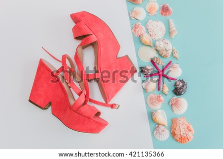 Summer Sandals and seashells on pastel backgrounds. Fashion style Minimalism Set. Flat lay, Top view.
