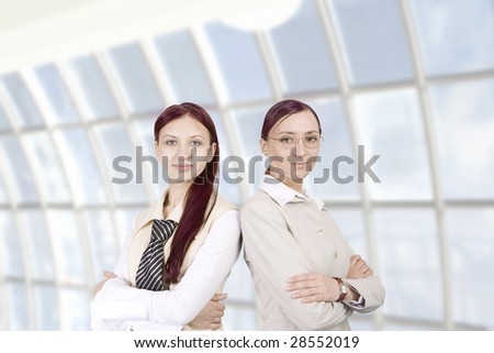 two representative businesswomen in modern office