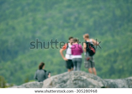 Active Lifestyle Young People on Mountain Range with Forest Backdrop