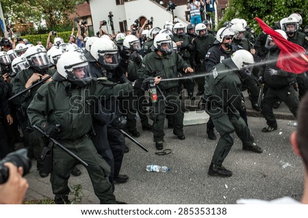 GARMISCH-PARTENKIRCHEN, GERMANY - JUNE 06: Police officers scuffle with anti-G7 protesters. G7 leaders will meet at nearby Schloss Elmau on June 7-8
