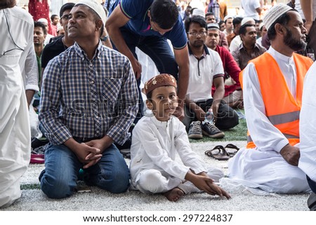 MILANO, JULY 17, 2015: the Muslim community in Milan celebrates Eid-Al-Fitr (Feast of Breaking the Fast), which marks the end of the month of Ramadan.