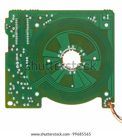 Old green circuit board from floppy disk drive. Object is isolated on white background without shadows.