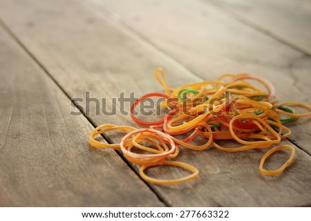 Rubber band on a background of wood table