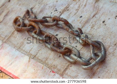 old chain for car on white background.
