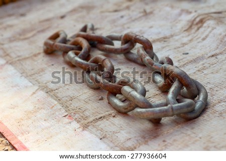 old chain for car on white background.