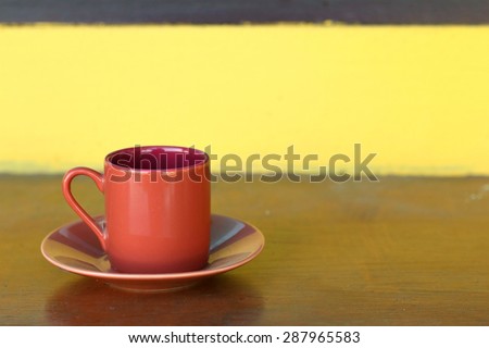 Ceramic coffee set plate at glass shop.