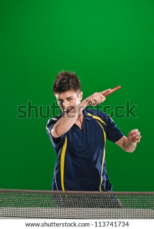 young man tennis-player in play on chroma key