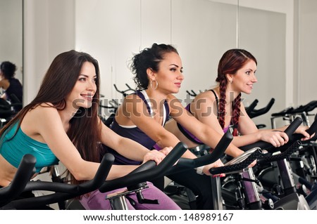 three women in the fitness club