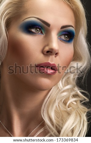 Fashion Model Portrait. Professional Makeup. False Eyelashes.